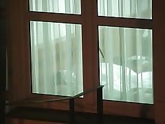 Хотел прозорец през courtains